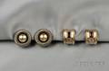 Two Pairs of Sterling Silver and 14kt Gold Earclips David Yurman