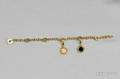 18kt Gold Onyx and Diamond Charm Bracelet Bulgari