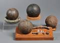 Four Excavated Iron Cannonballs