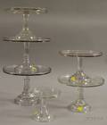 Six Colorless Glass Cake Stands