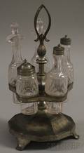 Roswell Gleason Pewter Footed Castor Stand with a Set of Five Colorless Pressed Pattern Glass Castor Bottles