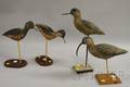 Four Carved and Painted Wooden Shorebird Decoys and Figures