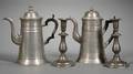 Two Pewter Coffeepots and a Pair of Candlesticks