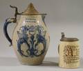 German Pewterlidded Cobalthighlighted Molded Stoneware Pitcher and a Heidelberg 12 Liter Stein