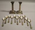 Eleven Durgin Bead Sterling Ice Cream Forks and a Pair of Gorham Weighted Sterling Corinthian Column Candlesticks