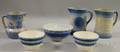 Three Blue and Whitedecorated Molded Stoneware Jugs and Three Banded Mochaware Bowls