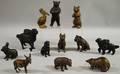 Twelve Painted Cast Iron and Metal Animal Figural Still Banks