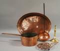 Four Pieces of Copper Kitchenware and a French Brass Candlestick