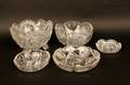 Four Circular Cut Glass Dishes