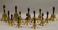 Fourteen Brass Hand Bells with Turned Wood Handles
