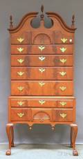 Chippendalestyle Carved Mahogany and Mahogany Veneer Bonnettop Highboy