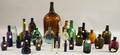 Approximately Thirty Assorted Mostly Colored Glass Bottles and Items