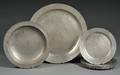 Eight Pewter Plates and Two Chargers