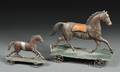 Two Polychromepainted Tin Horse PullToys