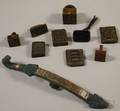 Nine Asian Bronze Seals and Weights and a Mixedmetal Buckle
