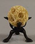 Chinese Carved Ivory Puzzle Ball on Carved Wood Stand