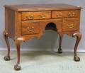 Chippendalestyle Carved Mahogany and Mahogany Veneer Lowboy