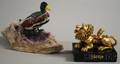 Georg O Wild Carved Stone Duck with Ruby Eyes and a Giltmetal Frank Meisler Lion o Judah Paperweight