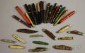 Seventeen Vintage Fountain Pens and Writing Instruments and Twelve Pocketknives