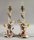 Pair of Von Schierholz Handpainted Porcelain Cherub Figural CandlestickTable Lamps