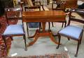 Inlaid Mahogany Pedestal Platformbase Card Table and a Set of Four Regencystyle Brassinlaid Dining Chairs