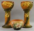 Pair of Roseville Pottery Clematis Jardinieres on Pedestals and a Magnolia Jardiniere