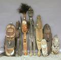 Eight Papua New Guinea Carved Wood Masks and Sculptures