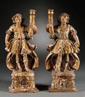 Pair of Figural Carved Polychrome and Giltwood Candlesticks