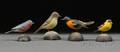 Four Carved and Painted Miniature Songbirds