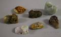 Seven Chinese Carved Jade Pendants and Figures