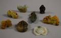 Eight Chinese Carved Jade Pendants and Figures