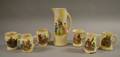 Seven Roseville Pottery Dutch Pattern Beverage Items