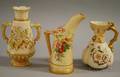 Two Royal Worcester Gilt and Handpainted Porcelain Jugs and a Vase