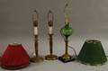 Pair of French Victorian Brass CandlesticksTable Lamps and a Brass and Green Glass Oil Lamp
