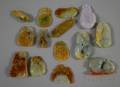 Fourteen Carved Chinese Jade Pendants