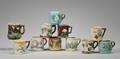 Eleven Assorted Majolica Mugs