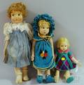 Three Cloth Dolls Six Ginny Doll Outfits in Original Boxes and Assorted Other Items