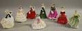 Eight Royal Doulton Porcelain Figures