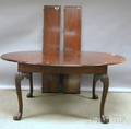 Georgianstyle Oval Carved Mahogany Dining Table with Paw Feet