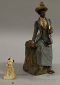 Early 20th Century European Painted Ceramic Figural Tobacco Jar Depicting a Black Woman Tourist and a Small Painted Plaster Promotio