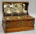 Brassmounted Oak and Mirrored Tantalus with a Set of Three Colorless Cut Glass Decanters