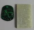 Carved Chloromelanite and Jade Pendants