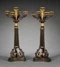 Pair of Charles X Patinated and Gilded Bronze Fivelight Candelabra