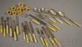 Twentyone Pieces of Ivory and Bonehandled Flatware and Eight Carved Ivory Napkin Rings