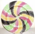 Unusual green brown yellow and red rainbow swirl plate