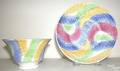 Excellent yellow blue red and green rainbow swirl pattern cup and saucer