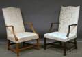 Two Reproduction Damaskupholstered Mahogany Lolling Chairs