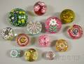 Thirteen Art Glass Paperweights and a Lucite Paperweight