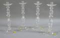 Set of Four Steuben Colorless Glass Candlesticks
