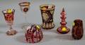 Five Pieces of Assorted Bohemian Enameled and Etched Ruby Flash Glass and a Red Cut to Clear Glass Paperweight